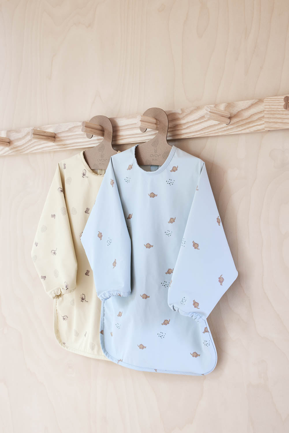 dino cape bib in dusty green 3
