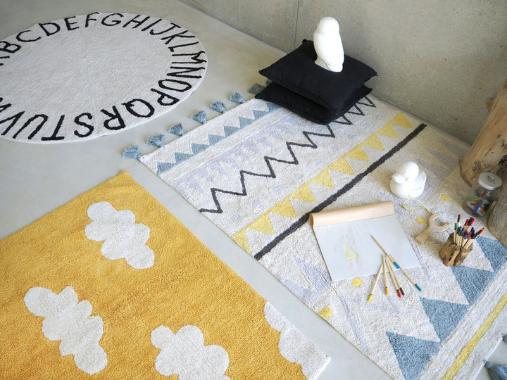 Clouds Rug in Mustard design by Lorena Canals